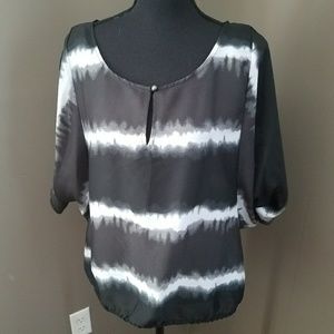 Beautiful sleeveless summer semi sheet blouse